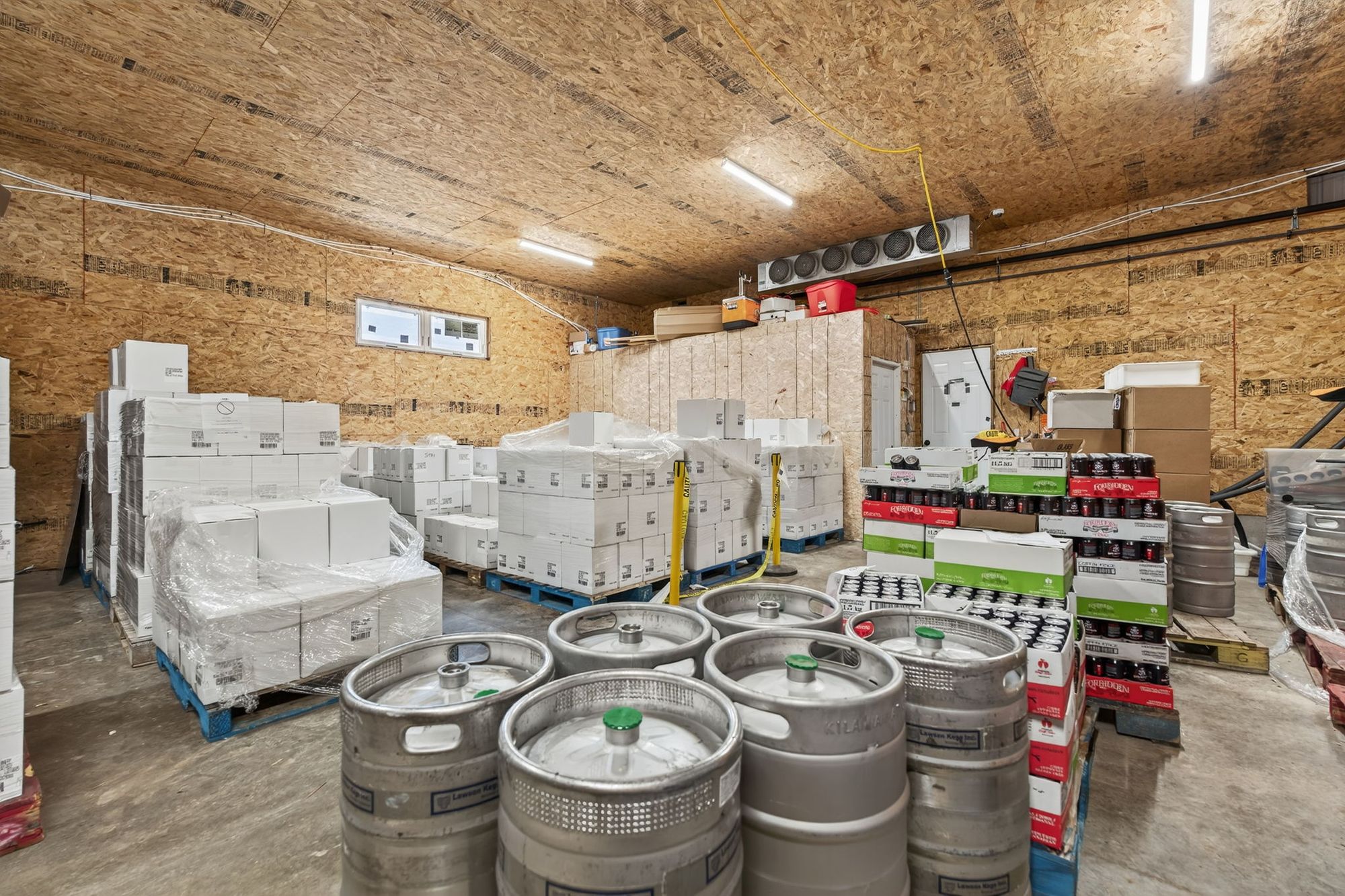 Cases, kegs and pallets in storage