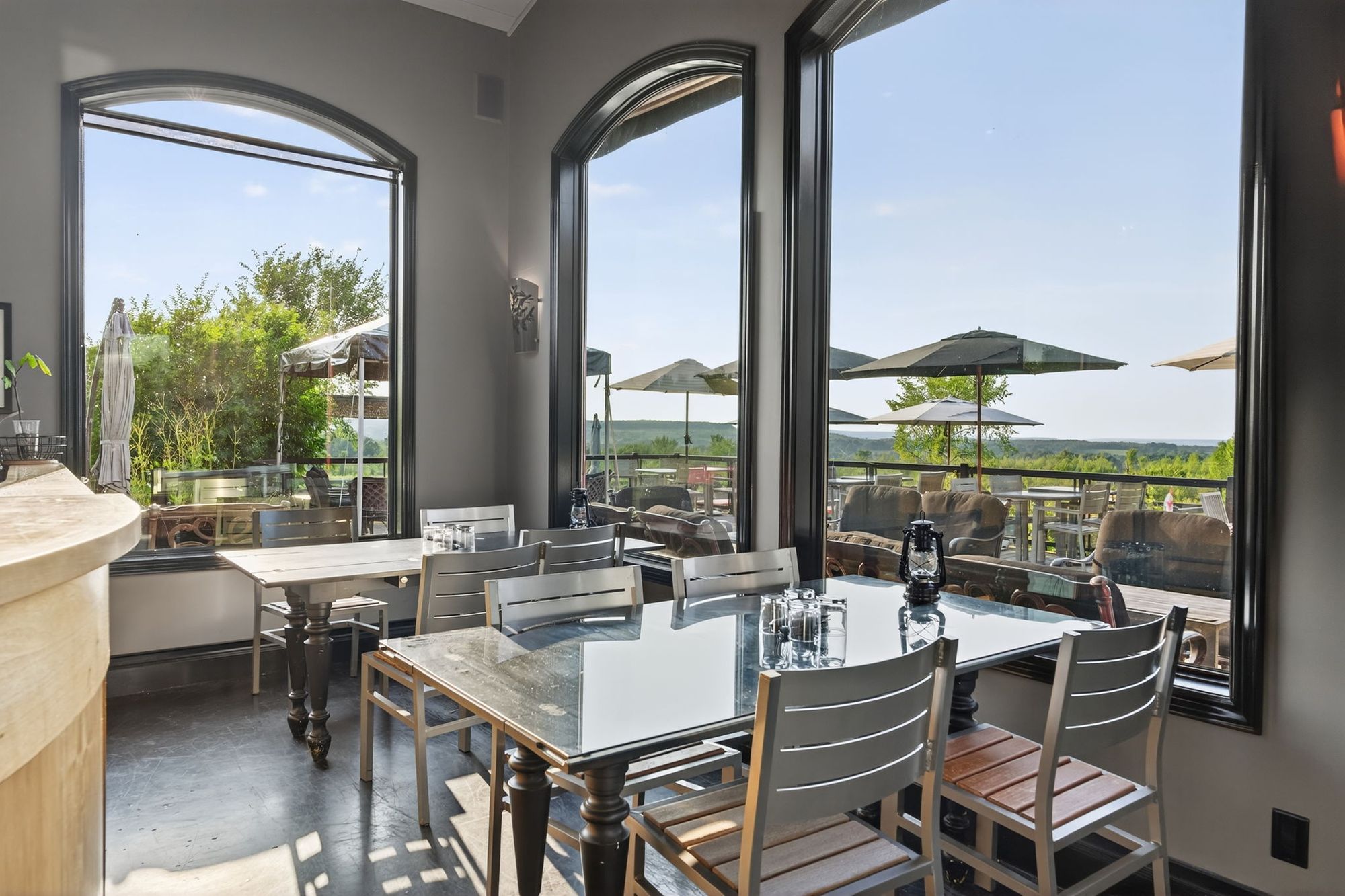 Window tables looking onto the deck and the view